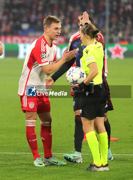2023-11-29 - Joshua Kimmich of Bayern Munich contests, referee Stepanie Frappart during the UEFA Champions League, Group A football match between Bayern Munich and FC Copenhagen on November 29, 2023 at Allianz Arena in Munich, Germany - FOOTBALL - CHAMPIONS LEAGUE - BAYERN MUNICH V COPENHAGEN - UEFA CHAMPIONS LEAGUE - SOCCER