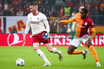 2023-11-29 - Scott McTominay of Manchester United and Wilfried Zaha of Galatasaray during the UEFA Champions League, Group A football match between Galatasaray and Manchester United on November 29, 2023 at the Ali Sami Yen Arena in Istanbul, Turkey - FOOTBALL - CHAMPIONS LEAGUE - GALATASARAY V MANCHESTER UNITED - UEFA CHAMPIONS LEAGUE - SOCCER