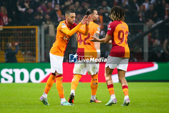 2023-11-29 - Hakim Ziyech of Galatasaray celebrates his goal 1-2 with Sacha Boey during the UEFA Champions League, Group A football match between Galatasaray and Manchester United on November 29, 2023 at the Ali Sami Yen Arena in Istanbul, Turkey - FOOTBALL - CHAMPIONS LEAGUE - GALATASARAY V MANCHESTER UNITED - UEFA CHAMPIONS LEAGUE - SOCCER