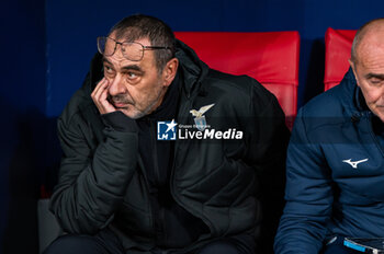2023-12-13 - Maurizio Sarri, coach of Lazio, seen sitting in the bench during the Champions League football match between Atletico Madrid and Lazio at Metropolitano Stadium in Madrid, Spain. - ATLETICO MADRID VS SS LAZIO - UEFA CHAMPIONS LEAGUE - SOCCER