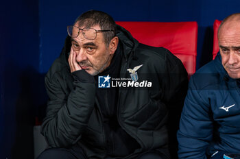 2023-12-13 - Maurizio Sarri, coach of Lazio, seen sitting in the bench during the Champions League football match between Atletico Madrid and Lazio at Metropolitano Stadium in Madrid, Spain. - ATLETICO MADRID VS SS LAZIO - UEFA CHAMPIONS LEAGUE - SOCCER