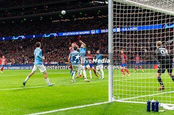 2023-12-13 - Jose Gimenez of Atletico Madrid seen in action against Ciro Immobile of Lazio during the Champions League football match between Atletico Madrid and Lazio at Metropolitano Stadium in Madrid, Spain. - ATLETICO MADRID VS SS LAZIO - UEFA CHAMPIONS LEAGUE - SOCCER