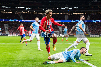 2023-12-13 - Antoine Griezmann of Atletico Madrid seen in action against Mario Gila of Lazio during the Champions League football match between Atletico Madrid and Lazio at Metropolitano Stadium in Madrid, Spain. - ATLETICO MADRID VS SS LAZIO - UEFA CHAMPIONS LEAGUE - SOCCER