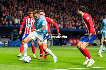 2023-12-13 - Matias Vecino of Lazio seen in action against Saul Niguez and Mario Hermoso of Atletico Madrid during the Champions League football match between Atletico Madrid and Lazio at Metropolitano Stadium in Madrid, Spain. - ATLETICO MADRID VS SS LAZIO - UEFA CHAMPIONS LEAGUE - SOCCER