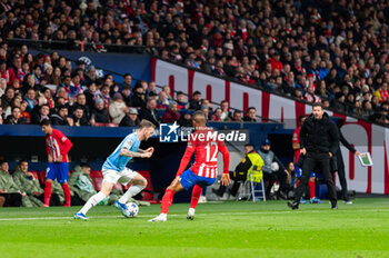 2023-12-13 - Manuel Lazzari of Lazio seen in action against Samuel Lino of Atletico Madrid during the Champions League football match between Atletico Madrid and Lazio at Metropolitano Stadium in Madrid, Spain. - ATLETICO MADRID VS SS LAZIO - UEFA CHAMPIONS LEAGUE - SOCCER