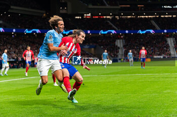 2023-12-13 - Matteo Guendouzi of Lazio seen in action against Caglar Soyuncu of Atletico Madrid during the Champions League football match between Atletico Madrid and Lazio at Metropolitano Stadium in Madrid, Spain. - ATLETICO MADRID VS SS LAZIO - UEFA CHAMPIONS LEAGUE - SOCCER