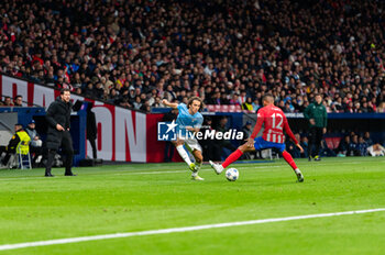 2023-12-13 - Matteo Guendouzi of Lazio seen in action during the Champions League football match between Atletico Madrid and Lazio at Metropolitano Stadium in Madrid, Spain. - ATLETICO MADRID VS SS LAZIO - UEFA CHAMPIONS LEAGUE - SOCCER