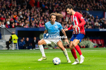 2023-12-13 - Matteo Guendouzi of Lazio seen in action against Mario Hermoso of Atletico Madrid during the Champions League football match between Atletico Madrid and Lazio at Metropolitano Stadium in Madrid, Spain. - ATLETICO MADRID VS SS LAZIO - UEFA CHAMPIONS LEAGUE - SOCCER