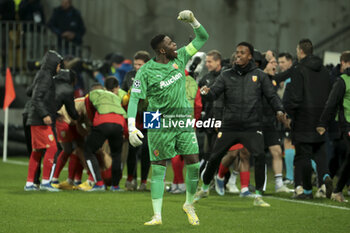 2023-12-12 - Lens goalkeeper Brice Samba celebrates the second goal of his team during the UEFA Champions League, Group B football match between RC Lens and Sevilla FC on December 12, 2023 at Bollaert-Delelis stadium in Lens, France - FOOTBALL - CHAMPIONS LEAGUE - LENS V SEVILLA - UEFA CHAMPIONS LEAGUE - SOCCER