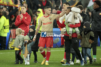 2023-12-12 - Ruben Aguilar, Wesley Said of Lens and teammates salute the supporters following the UEFA Champions League, Group B football match between RC Lens and Sevilla FC on December 12, 2023 at Bollaert-Delelis stadium in Lens, France - FOOTBALL - CHAMPIONS LEAGUE - LENS V SEVILLA - UEFA CHAMPIONS LEAGUE - SOCCER