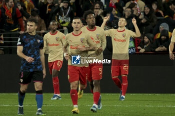 2023-12-12 - Przemyslaw Frankowski of Lens #29 celebrates his goal with teammates during the UEFA Champions League, Group B football match between RC Lens and Sevilla FC on December 12, 2023 at Bollaert-Delelis stadium in Lens, France - FOOTBALL - CHAMPIONS LEAGUE - LENS V SEVILLA - UEFA CHAMPIONS LEAGUE - SOCCER