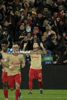 2023-12-12 - Przemyslaw Frankowski of Lens #29 celebrates his goal with teammates during the UEFA Champions League, Group B football match between RC Lens and Sevilla FC on December 12, 2023 at Bollaert-Delelis stadium in Lens, France - FOOTBALL - CHAMPIONS LEAGUE - LENS V SEVILLA - UEFA CHAMPIONS LEAGUE - SOCCER