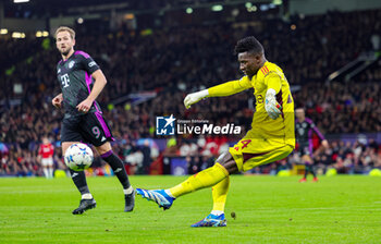 2023-12-13 - Andre Onana (24) of Manchester United clears the ball during the UEFA Champions League, Group A football match between Manchester United and Bayern Munich on 12 December 2023 at Old Trafford in Manchester, England - FOOTBALL - CHAMPIONS LEAGUE - MANCHESTER UNITED V BAYERN MUNICH - UEFA CHAMPIONS LEAGUE - SOCCER
