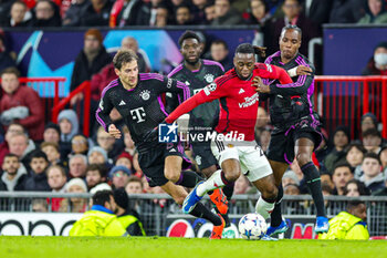 2023-12-13 - Aaron Wan-Bissaka (29) of Manchester United and Leon Goretzka, Mathys Tel of Bayern Munich during the UEFA Champions League, Group A football match between Manchester United and Bayern Munich on 12 December 2023 at Old Trafford in Manchester, England - FOOTBALL - CHAMPIONS LEAGUE - MANCHESTER UNITED V BAYERN MUNICH - UEFA CHAMPIONS LEAGUE - SOCCER