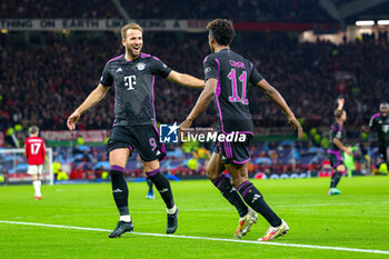2023-12-13 - Kingsley Coman (11) of Bayern Munich celebrates his goal 0-1 with Harry Kane during the UEFA Champions League, Group A football match between Manchester United and Bayern Munich on 12 December 2023 at Old Trafford in Manchester, England - FOOTBALL - CHAMPIONS LEAGUE - MANCHESTER UNITED V BAYERN MUNICH - UEFA CHAMPIONS LEAGUE - SOCCER