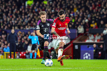 2023-12-13 - Bruno Fernandes (8) of Manchester United and Joshua Kimmich (6) of Bayern Munich during the UEFA Champions League, Group A football match between Manchester United and Bayern Munich on 12 December 2023 at Old Trafford in Manchester, England - FOOTBALL - CHAMPIONS LEAGUE - MANCHESTER UNITED V BAYERN MUNICH - UEFA CHAMPIONS LEAGUE - SOCCER