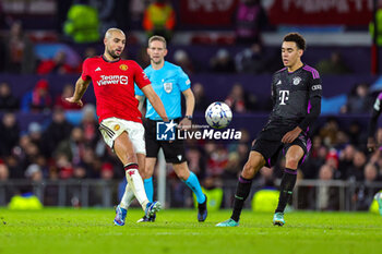 2023-12-13 - Sofyan Amrabat (4) of Manchester United during the UEFA Champions League, Group A football match between Manchester United and Bayern Munich on 12 December 2023 at Old Trafford in Manchester, England - FOOTBALL - CHAMPIONS LEAGUE - MANCHESTER UNITED V BAYERN MUNICH - UEFA CHAMPIONS LEAGUE - SOCCER