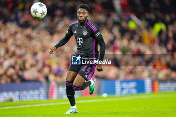 2023-12-13 - Alphonso Davies (19) of Bayern Munich during the UEFA Champions League, Group A football match between Manchester United and Bayern Munich on 12 December 2023 at Old Trafford in Manchester, England - FOOTBALL - CHAMPIONS LEAGUE - MANCHESTER UNITED V BAYERN MUNICH - UEFA CHAMPIONS LEAGUE - SOCCER