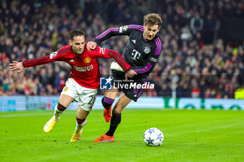 2023-12-13 - Antony (21) of Manchester United and Leon Goretzka (8) of Bayern Munich during the UEFA Champions League, Group A football match between Manchester United and Bayern Munich on 12 December 2023 at Old Trafford in Manchester, England - FOOTBALL - CHAMPIONS LEAGUE - MANCHESTER UNITED V BAYERN MUNICH - UEFA CHAMPIONS LEAGUE - SOCCER