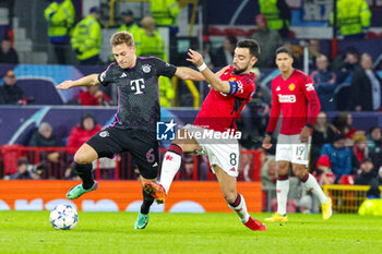 2023-12-13 - Joshua Kimmich (6) of Bayern Munich and Bruno Fernandes (8) of Manchester United during the UEFA Champions League, Group A football match between Manchester United and Bayern Munich on 12 December 2023 at Old Trafford in Manchester, England - FOOTBALL - CHAMPIONS LEAGUE - MANCHESTER UNITED V BAYERN MUNICH - UEFA CHAMPIONS LEAGUE - SOCCER
