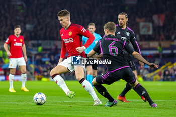 2023-12-13 - Scott McTominay (39) of Manchester United and Joshua Kimmich (6) of Bayern Munich during the UEFA Champions League, Group A football match between Manchester United and Bayern Munich on 12 December 2023 at Old Trafford in Manchester, England - FOOTBALL - CHAMPIONS LEAGUE - MANCHESTER UNITED V BAYERN MUNICH - UEFA CHAMPIONS LEAGUE - SOCCER