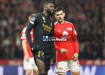 2023-12-12 - Antonio Rudiger of Real Madrid and Kevin Volland of Union Berlin during the UEFA Champions League, Group C football match between Union Berlin and Real Madrid on December 12, 2023 at Olympiastadion in Berlin, Germany - FOOTBALL - CHAMPIONS LEAGUE - UNION BERLIN V REAL MADRID - UEFA CHAMPIONS LEAGUE - SOCCER