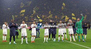 2023-12-13 - Paris SG players celebrate at full time during the UEFA Champions League, Group F football match between Borussia Dortmund and Paris Saint-Germain on December 13, 2023 at Signal Iduna Park in Dortmund, Germany - FOOTBALL - CHAMPIONS LEAGUE - DORTMUND V PARIS SG - UEFA CHAMPIONS LEAGUE - SOCCER