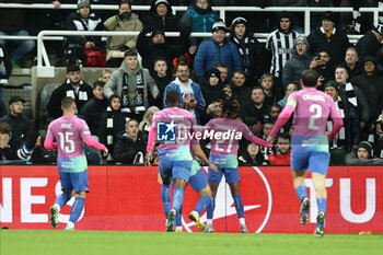 2023-12-13 - Samuel Chukwueze (21) of AC Milan scores a goal 1-2 and celebrates during the UEFA Champions League, Group F football match between Newcastle United and AC Milan on 13 December 2023 at St. James's Park in Newcastle, England - FOOTBALL - CHAMPIONS LEAGUE - NEWCASTLE V AC MILAN - UEFA CHAMPIONS LEAGUE - SOCCER