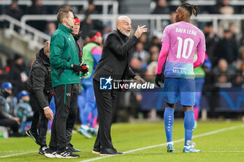 2023-12-13 - Milan coach Stefano Pioli and Milan forward Rafael Leao during the UEFA Champions League, Group F football match between Newcastle United and AC Milan on 13 December 2023 at St. James's Park in Newcastle, England - FOOTBALL - CHAMPIONS LEAGUE - NEWCASTLE V AC MILAN - UEFA CHAMPIONS LEAGUE - SOCCER