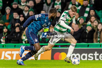 2023-12-13 - Mitchel Frame of Celtic FC and Lutsharel Geertruida of Feyenoord during the UEFA Champions League, Group E football match between Celtic FC and Feyenoord on December 13, 2023 at Celtic Park in Glasgow, Scotland - FOOTBALL - CHAMPIONS LEAGUE - CELTIC V FEYENOORD - UEFA CHAMPIONS LEAGUE - SOCCER