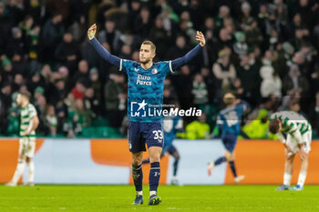 2023-12-13 - David Hancko of Feyenoord celebrates after the Yankuba Minteh's goal during the UEFA Champions League, Group E football match between Celtic FC and Feyenoord on December 13, 2023 at Celtic Park in Glasgow, Scotland - FOOTBALL - CHAMPIONS LEAGUE - CELTIC V FEYENOORD - UEFA CHAMPIONS LEAGUE - SOCCER