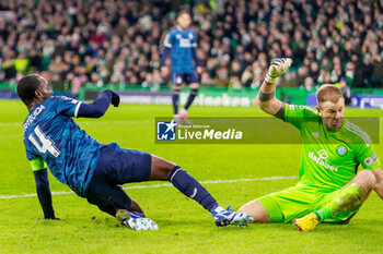 2023-12-13 - Lutsharel Geertruida of Feyenoord and Joe Hart of Celtic FC during the UEFA Champions League, Group E football match between Celtic FC and Feyenoord on December 13, 2023 at Celtic Park in Glasgow, Scotland - FOOTBALL - CHAMPIONS LEAGUE - CELTIC V FEYENOORD - UEFA CHAMPIONS LEAGUE - SOCCER