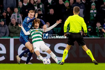 2023-12-13 - Kyogo Furuhashi of Celtic FC and Thomas Beelen of Feyenoord during the UEFA Champions League, Group E football match between Celtic FC and Feyenoord on December 13, 2023 at Celtic Park in Glasgow, Scotland - FOOTBALL - CHAMPIONS LEAGUE - CELTIC V FEYENOORD - UEFA CHAMPIONS LEAGUE - SOCCER