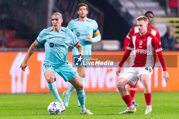 2023-12-13 - Oriol Romeu of FC Barcelona battles for the ball with Arthur Vermeeren of Royal Antwerp FC during the UEFA Champions League, Group H football match between Royal Antwerp FC and FC Barcelona on December 13, 2023 at the Stadion Bosuil in Antwerpen, Belgium - FOOTBALL - CHAMPIONS LEAGUE - ROYAL ANTWERP V FC BARCELONA - UEFA CHAMPIONS LEAGUE - SOCCER