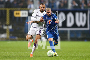 2023-04-13 - Arthur Mendonca Cabral of Fiorentina Pedro Rebocho of Lech during the UEFA Europa Conference League, Quarter-finals, 1st leg football match between KKS Lech Poznan and ACF Fiorentina on April 13, 2023 at INEA Stadion in Poznan, Poland - FOOTBALL - CONFERENCE LEAGUE - LECH POZNAN V FIORENTINA - UEFA CONFERENCE LEAGUE - SOCCER