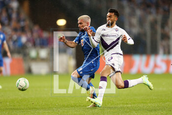 2023-04-13 - Pedro Rebocho of Lech Nicolas Gonzalez of Fiorentina during the UEFA Europa Conference League, Quarter-finals, 1st leg football match between KKS Lech Poznan and ACF Fiorentina on April 13, 2023 at INEA Stadion in Poznan, Poland - FOOTBALL - CONFERENCE LEAGUE - LECH POZNAN V FIORENTINA - UEFA CONFERENCE LEAGUE - SOCCER