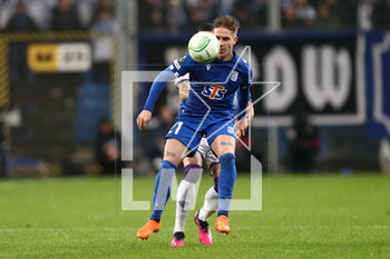 2023-04-13 - Cristiano Biraghi of Fiorentina Michal Skoras of Lech during the UEFA Europa Conference League, Quarter-finals, 1st leg football match between KKS Lech Poznan and ACF Fiorentina on April 13, 2023 at INEA Stadion in Poznan, Poland - FOOTBALL - CONFERENCE LEAGUE - LECH POZNAN V FIORENTINA - UEFA CONFERENCE LEAGUE - SOCCER