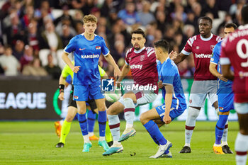 2023-05-12 - Lucas Paqueta (11) of West Ham United tussles with Tijjani Reijnders (6) of AZ Alkmaar during the UEFA Europa Conference League, Semi-finals, 1st leg football match between West Ham United and AZ Alkmaar on 11 May 2023 at the London Stadium in London, England - FOOTBALL - CONFERENCE LEAGUE - WEST HAM V AZ ALKMAAR - UEFA CONFERENCE LEAGUE - SOCCER
