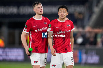 2023-05-18 - Sam Beukema, Yukinari Sugawara of AZ Alkmaar look dejected at full time during the UEFA Europa Conference League, Semi-finals, 2nd leg football match between AZ and West Ham United on May 18, 2023 at the AFAS Stadion in Alkmaar, Netherlands - FOOTBALL - CONFERENCE LEAGUE - AZ ALKMAAR V WEST HAM - UEFA CONFERENCE LEAGUE - SOCCER