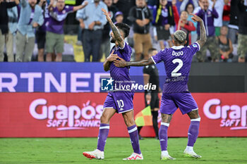 2023-08-31 - ACF Fiorentina's Argentinian forward Nicolas Gonzalez celebrates after scoring a goal with ACF Fiorentina's Brazilian defender Domilson Cordeiro dos Santos knows as Dodo - ACF FIORENTINA VS SK RAPID WIEN - UEFA CONFERENCE LEAGUE - SOCCER