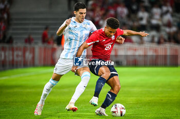 2023-08-24 - Niko JANKOVIC of Rijeka and Tiago SANTOS of Lille during the UEFA Europa Conference League, Play-offs, 1st leg football match between LOSC Lille and HNK Rijeka on August 24, 2023 at Pierre Mauroy stadium in Villeneuve-d'Ascq near Lille, France - FOOTBALL - CONFERENCE LEAGUE - LILLE V RIJEKA - UEFA CONFERENCE LEAGUE - SOCCER