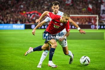 2023-08-24 - Edon ZHEGROVA of Lille and Bruno GODA of Rijeka during the UEFA Europa Conference League, Play-offs, 1st leg football match between LOSC Lille and HNK Rijeka on August 24, 2023 at Pierre Mauroy stadium in Villeneuve-d'Ascq near Lille, France - FOOTBALL - CONFERENCE LEAGUE - LILLE V RIJEKA - UEFA CONFERENCE LEAGUE - SOCCER
