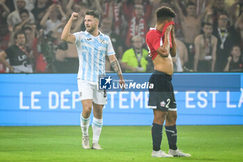 2023-08-24 - Marco PASALIC of Rijeka celebrates his goal and Tiago SANTOS of Lille looks dejected during the UEFA Europa Conference League, Play-offs, 1st leg football match between LOSC Lille and HNK Rijeka on August 24, 2023 at Pierre Mauroy stadium in Villeneuve-d'Ascq near Lille, France - FOOTBALL - CONFERENCE LEAGUE - LILLE V RIJEKA - UEFA CONFERENCE LEAGUE - SOCCER