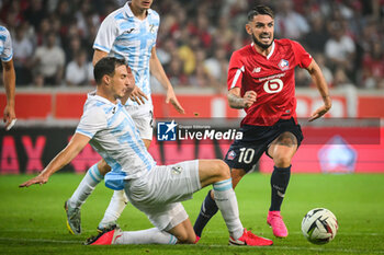 2023-08-24 - Matej MITROVIC of Rijeka and Remy CABELLA of Lille during the UEFA Europa Conference League, Play-offs, 1st leg football match between LOSC Lille and HNK Rijeka on August 24, 2023 at Pierre Mauroy stadium in Villeneuve-d'Ascq near Lille, France - FOOTBALL - CONFERENCE LEAGUE - LILLE V RIJEKA - UEFA CONFERENCE LEAGUE - SOCCER