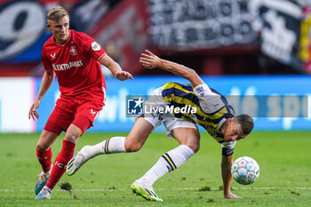 2023-08-31 - Max Bruns of FC Twente and Edin Dzeko of Fenerbahce during the UEFA Europa Conference League, Play-offs, 2nd leg football match between FC Twente and Fenerbahce on August 31, 2023 at De Grolsch Veste in Enschede, Netherlands - FOOTBALL - CONFERENCE LEAGUE - TWENTE V FENERBAHCE - UEFA CONFERENCE LEAGUE - SOCCER