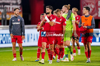 2023-08-31 - Twente players look dejected after defeat during the UEFA Europa Conference League, Play-offs, 2nd leg football match between FC Twente and Fenerbahce on August 31, 2023 at De Grolsch Veste in Enschede, Netherlands - FOOTBALL - CONFERENCE LEAGUE - TWENTE V FENERBAHCE - UEFA CONFERENCE LEAGUE - SOCCER