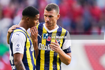 2023-08-31 - Jayden Oosterwolde of Fenerbahce in discussion with Edin Dzeko during the UEFA Europa Conference League, Play-offs, 2nd leg football match between FC Twente and Fenerbahce on August 31, 2023 at De Grolsch Veste in Enschede, Netherlands - FOOTBALL - CONFERENCE LEAGUE - TWENTE V FENERBAHCE - UEFA CONFERENCE LEAGUE - SOCCER