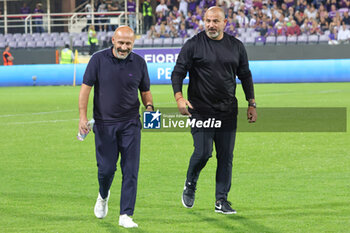2023-10-05 - Head Coach Vincenzo Italiano of the ACF Fiorentina talks to Head Coach Dejan Stankovic of the Ferencvarosi TC , prior to the Conference League match between ACF Fiorentina and Ferencvarosi TC at Stadio Artemio Franchi on October 5, 2023 in Florence, Italy - ACF FIORENTINA VS FERENCVAROSI TC - UEFA CONFERENCE LEAGUE - SOCCER