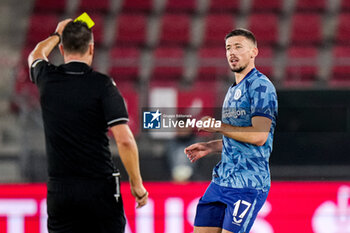 2023-10-26 - Referee Sven Jablonksi shows yellow card to Clement Lenglet of Aston Villa during the UEFA Europa Conference League, Group E football match between AZ Alkmaar and Aston Villa FC on October 26, 2023 at AFAS Stadion in Alkmaar, Netherlands - FOOTBALL - CONFERENCE LEAGUE - AZ ALKMAAR V ASTON VILLA - UEFA CONFERENCE LEAGUE - SOCCER