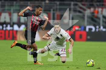 2023-01-11 - Samuele Ricci of Torino FC competes for the ball with Aster Vranckx of AC Milan during Coppa Italia 2022/23 football match between AC Milan and Torino FC at San Siro Stadium, Milan, Italy on January 11, 2023 - AC MILAN VS TORINO FC - ITALIAN CUP - SOCCER